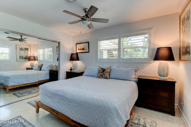 bedroom featuring a closet and ceiling fan