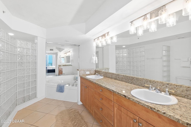 3315 S Atlantic Ave Unit 408, Daytona Beach Shores, FL 32118 - full bath with a bath, double vanity, tile patterned flooring, and a tile shower