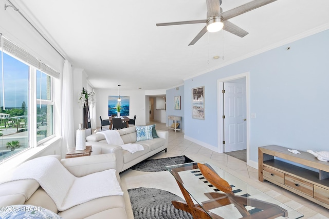 3315 S Atlantic Ave Unit 408, Daytona Beach Shores, FL 32118 - living area featuring light tile patterned flooring, a ceiling fan, and crown molding