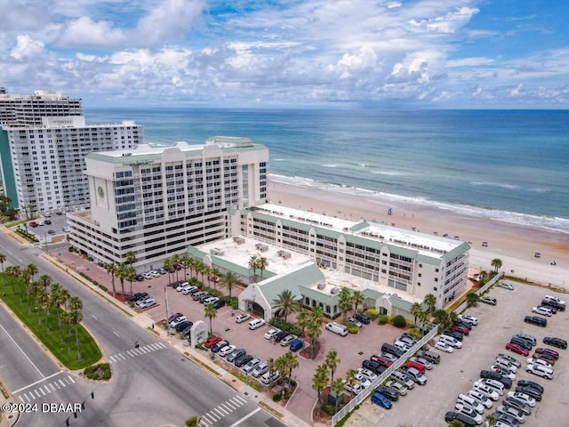 bird's eye view with a view of the beach and a water view