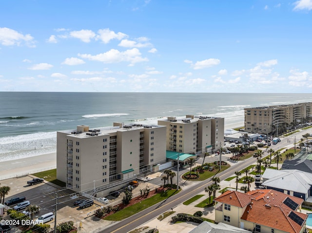 aerial view with a view of the beach and a water view