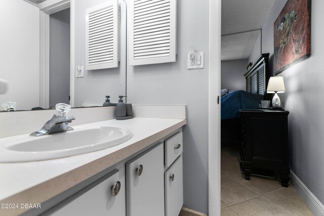 bathroom featuring vanity and tile patterned floors