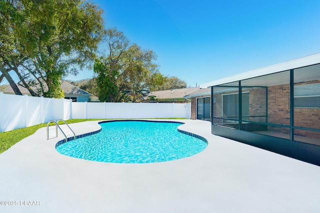 view of swimming pool featuring a fenced backyard, a fenced in pool, and a patio