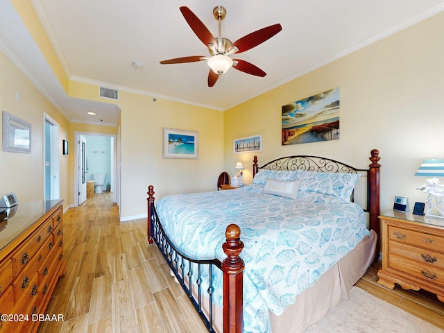 bedroom with light hardwood / wood-style flooring, ceiling fan, and crown molding