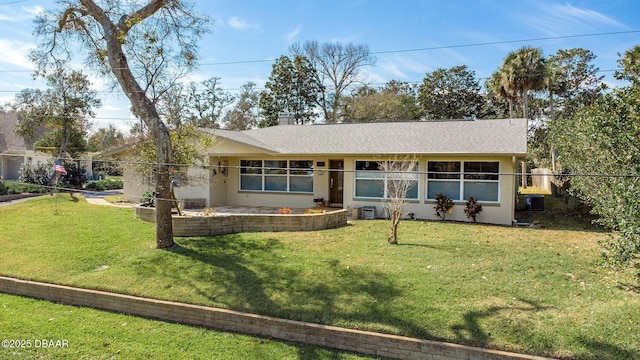 single story home with a front yard