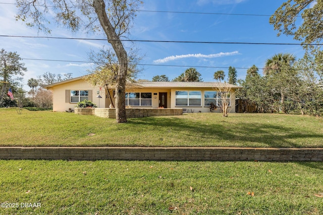 single story home with a front yard