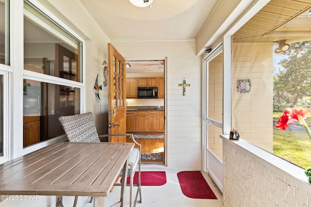 sunroom with plenty of natural light