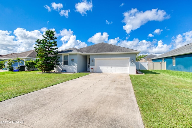 single story home featuring driveway, a gate, a front lawn, and stucco siding