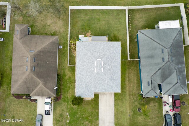 back of property featuring a yard and a patio area