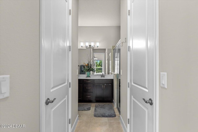 bathroom with vanity and tile patterned floors