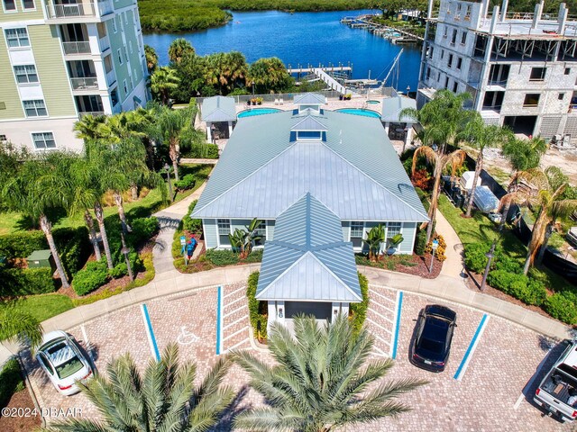 birds eye view of property featuring a water view