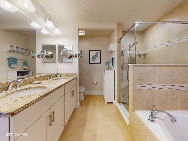 full bathroom with shower with separate bathtub, a textured ceiling, toilet, and vanity