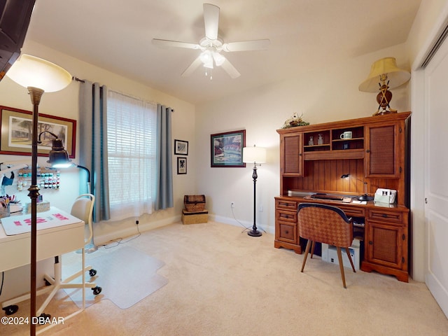 carpeted home office with ceiling fan