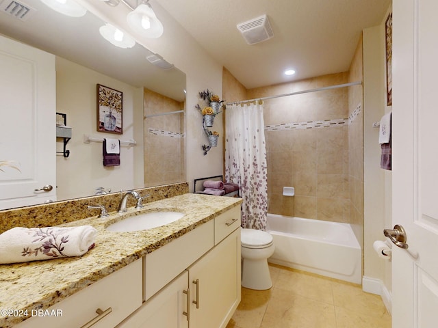 full bathroom with toilet, shower / tub combo, vanity, and tile patterned floors