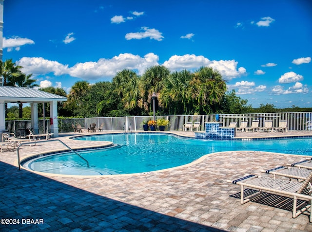 view of pool featuring a patio and a gazebo