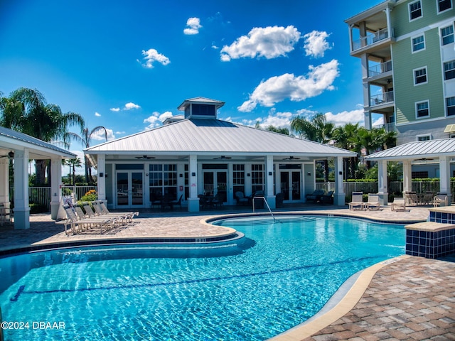 view of pool featuring a patio