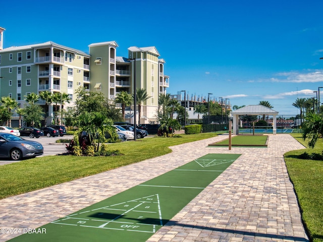 surrounding community featuring a yard and a gazebo