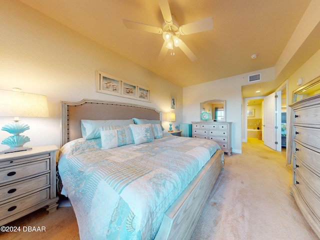 bedroom featuring light carpet and ceiling fan