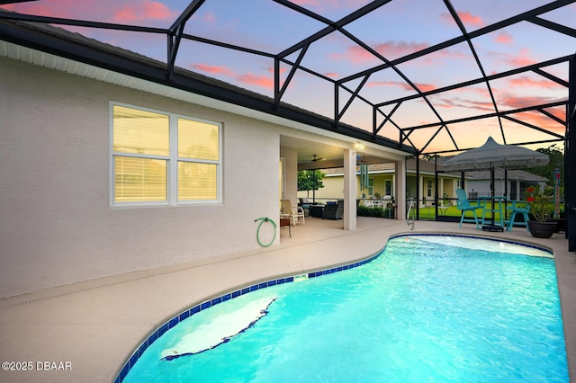 126 Briargate Look, Ormond Beach, FL 32174 - pool at dusk featuring an outdoor pool, a patio area, and an outdoor living space