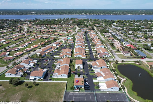 drone / aerial view with a water view