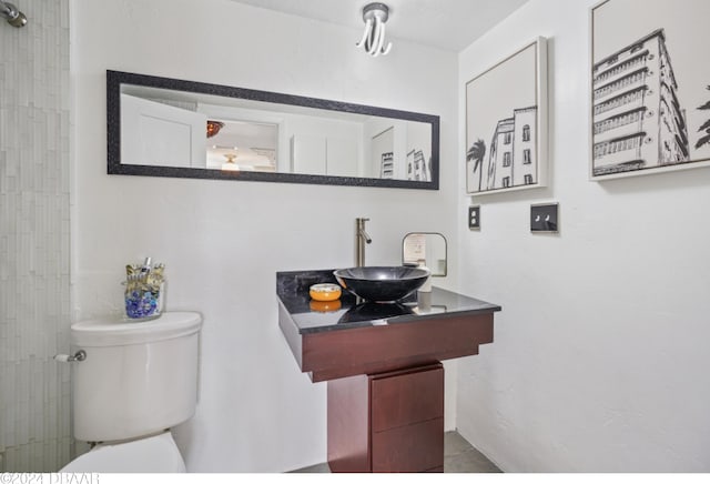 bathroom featuring sink and toilet