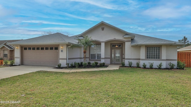 ranch-style house featuring a garage and a front yard