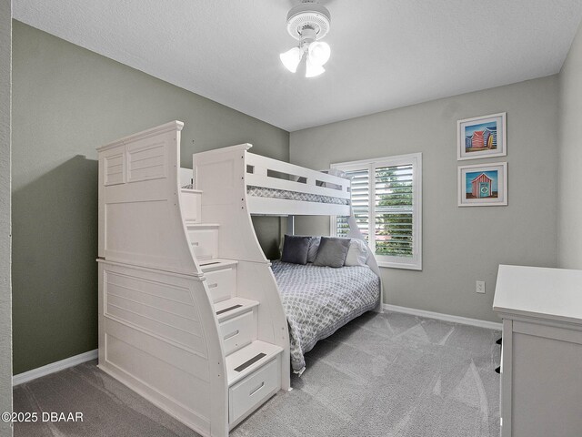 5300 S Atlantic Ave Unit 6-301, New Smyrna Beach, FL 32169 - bedroom featuring light colored carpet and baseboards