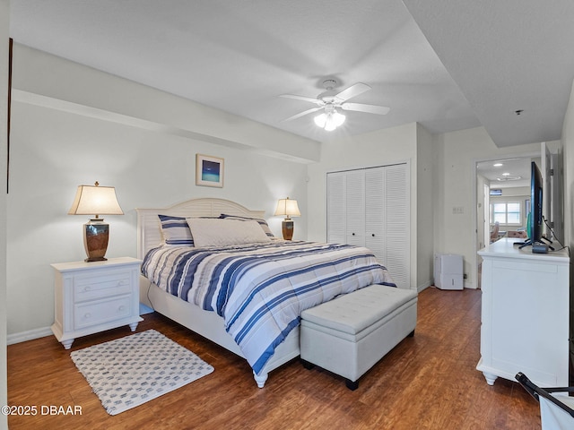5300 S Atlantic Ave Unit 6-301, New Smyrna Beach, FL 32169 - bedroom with a closet, baseboards, wood finished floors, and ceiling fan