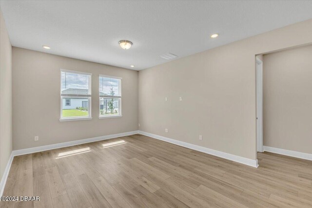 3116 Legends Preserve Dr, Daytona Beach, FL 32124 - unfurnished room with light wood-type flooring, baseboards, and recessed lighting