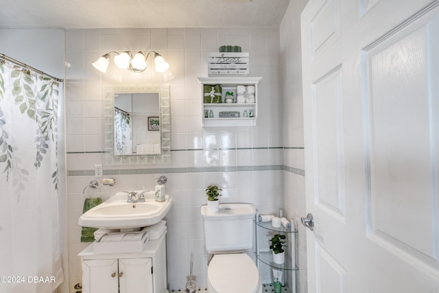 bathroom with backsplash, toilet, vanity, tile walls, and a shower with shower curtain