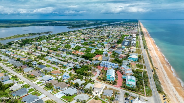 aerial view featuring a water view and a view of the beach