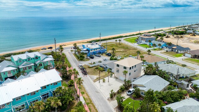 aerial view featuring a beach view and a water view