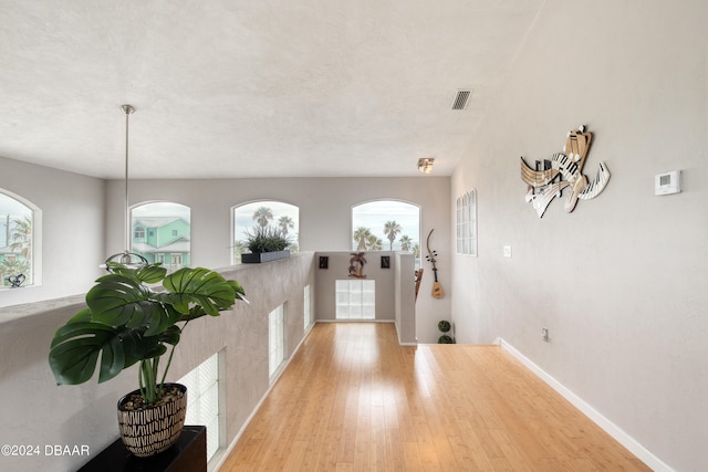 entryway with light hardwood / wood-style flooring