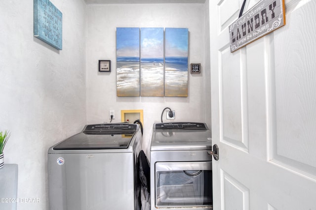 laundry area featuring washing machine and dryer