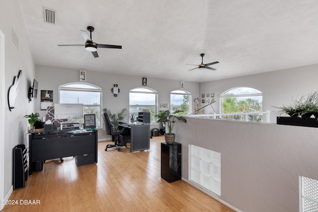 office area featuring hardwood / wood-style floors and ceiling fan