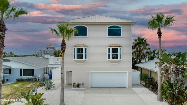 view of front of home with a garage