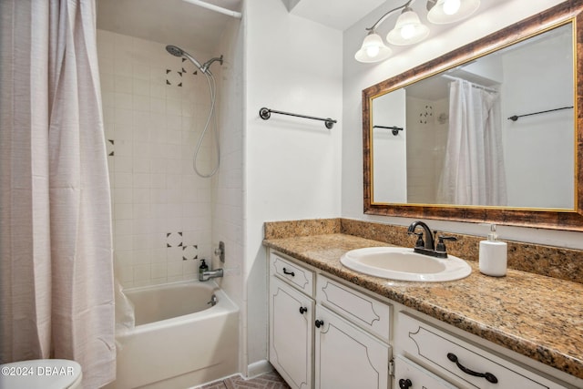 bathroom featuring vanity and shower / bath combination with curtain