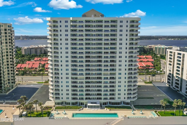 view of building exterior featuring a water view