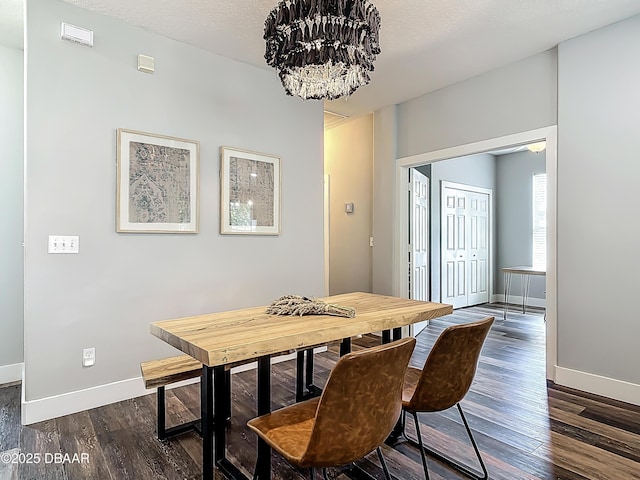 4225 Bristle Cone Way, Port Orange, FL 32129 - dining room with a chandelier and dark wood finished floors