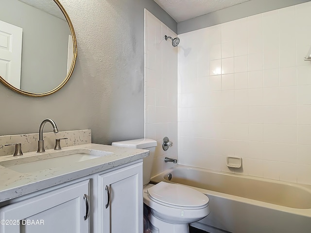 4225 Bristle Cone Way, Port Orange, FL 32129 - bathroom with vanity, tub / shower combination, and a textured wall