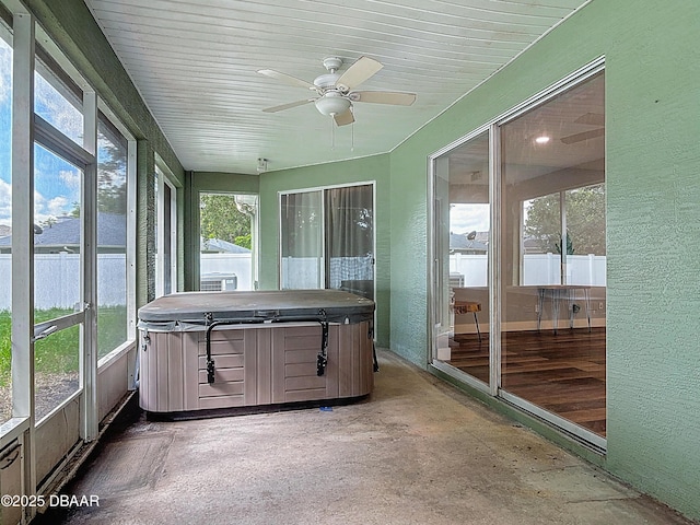 4225 Bristle Cone Way, Port Orange, FL 32129 - sunroom / solarium featuring a hot tub, healthy amount of natural light, and a ceiling fan