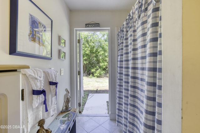 doorway featuring tile patterned floors