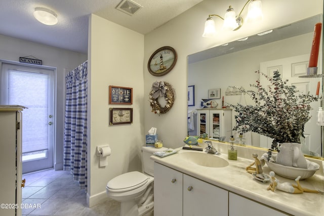 full bathroom with vanity, visible vents, a textured ceiling, tile patterned floors, and toilet