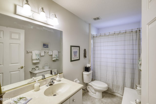 bathroom featuring vanity, visible vents, tile patterned flooring, curtained shower, and toilet