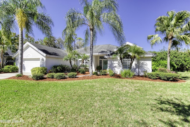 ranch-style home with stucco siding, an attached garage, driveway, and a front lawn