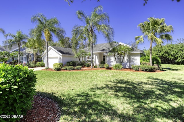 single story home featuring stucco siding, an attached garage, and a front lawn