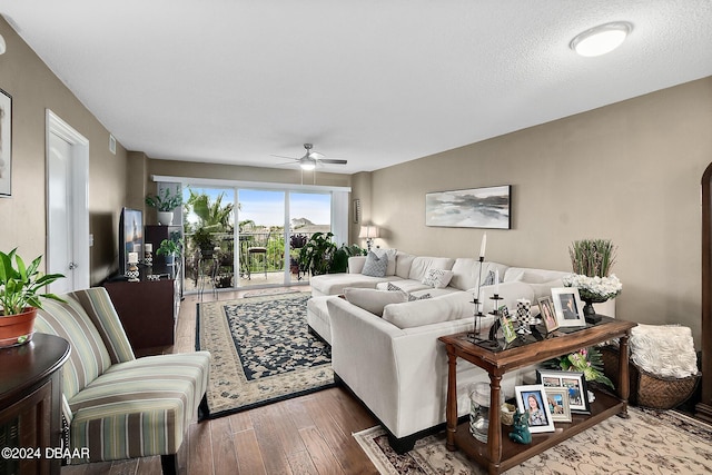 4 Oceans W Blvd Unit 507D, Daytona Beach Shores, FL 32118 - living room featuring wood-type flooring, a textured ceiling, and ceiling fan