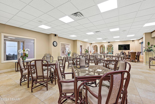 4 Oceans W Blvd Unit 507D, Daytona Beach Shores, FL 32118 - tiled dining room featuring a paneled ceiling