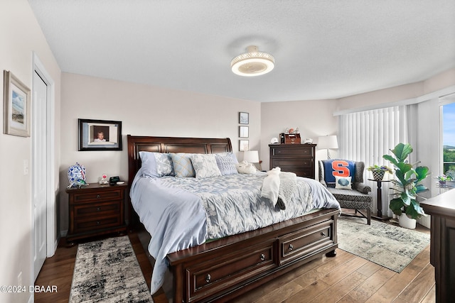 4 Oceans W Blvd Unit 507D, Daytona Beach Shores, FL 32118 - bedroom featuring dark wood-type flooring