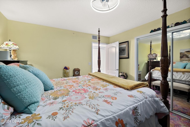 4 Oceans W Blvd Unit 507D, Daytona Beach Shores, FL 32118 - bedroom featuring a textured ceiling and a closet